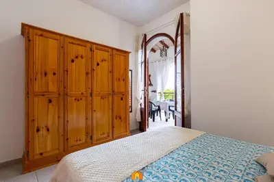 Letto o letti in una camera di Holiday House la terrazza