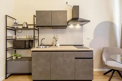 Cucina o angolo cottura di Raighinas - Cozy Apartment Cagliari Center