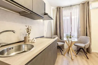 Cucina o angolo cottura di Raighinas - Cozy Apartment Cagliari Center