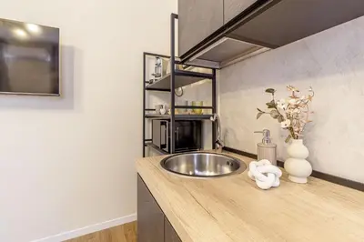 Cucina o angolo cottura di Raighinas - Cozy Apartment Cagliari Center