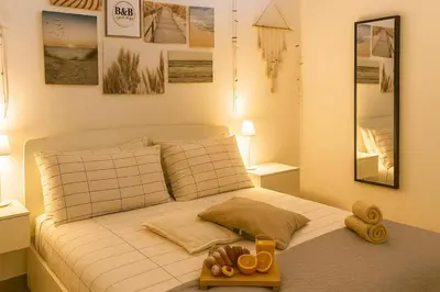 Letto o letti in una camera di Casa Orchidee 9