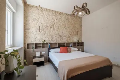 Letto o letti in una camera di Comfort Oleandro Suite