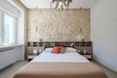Letto o letti in una camera di Comfort Oleandro Suite