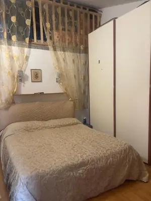 Letto o letti in una camera di Cristian house Torre Grande