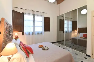 Letto o letti in una camera di IzzHome Elegance
