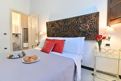 Letto o letti in una camera di IzzHome Elegance