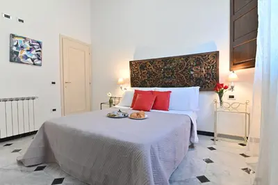Letto o letti in una camera di IzzHome Elegance