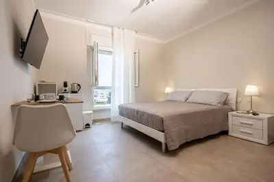 Letto o letti in una camera di ELEGANCE Calasetta's Rooms
