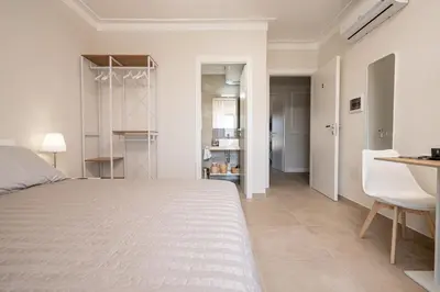 Letto o letti in una camera di ELEGANCE Calasetta's Rooms