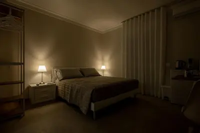 Letto o letti in una camera di ELEGANCE Calasetta's Rooms