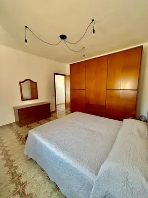 Letto o letti in una camera di Villa Cocca