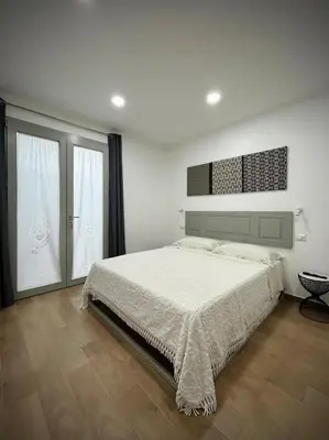 Letto o letti in una camera di Joma House