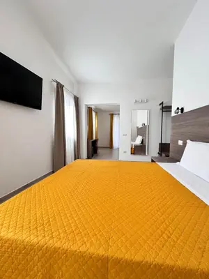 Letto o letti in una camera di Affittacamere Su Montecitoriu