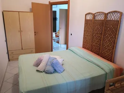 Letto o letti in una camera di Apartment Rose e Fiori Sardegna