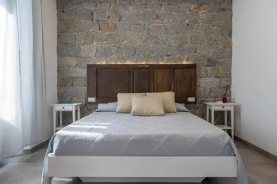 Letto o letti in una camera di Nonnalena