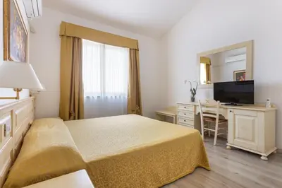 Letto o letti in una camera di Rodia Inn
