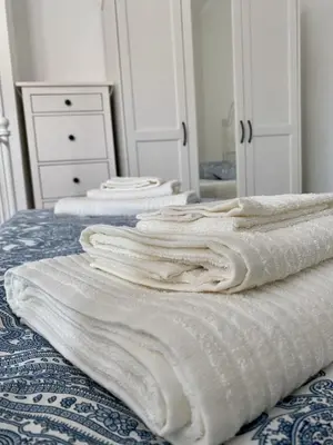 Letto o letti in una camera di Nido & Capanna