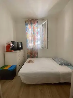 Letto o letti in una camera di Nido & Capanna