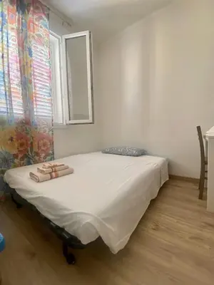 Letto o letti in una camera di Nido & Capanna