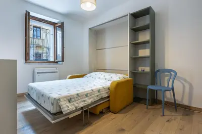 Letto o letti in una camera di GuestHost - San Mauro