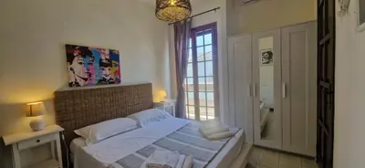 Letto o letti in una camera di Villa Lidia