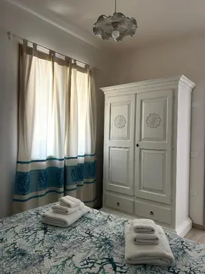 Letto o letti in una camera di Appartamento Gaia