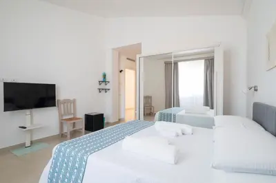 Letto o letti in una camera di I Centenari Longevity Rooms