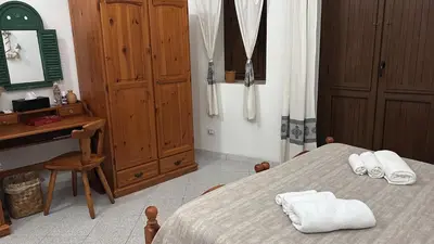 Letto o letti in una camera di Domo via Ozieri