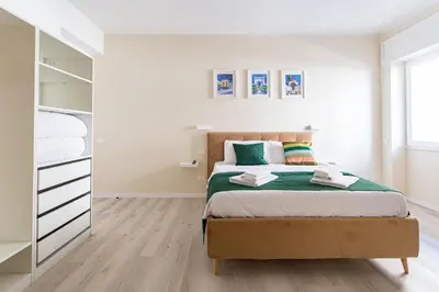 Letto o letti in una camera di Cagliari Essence - Boutique Stay in the Heart of Cagliari
