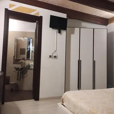 Letto o letti in una camera di Antico Centro Quartu