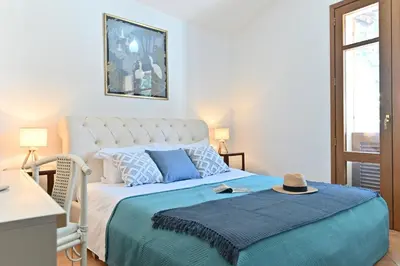 Letto o letti in una camera di IzzHome Gallery