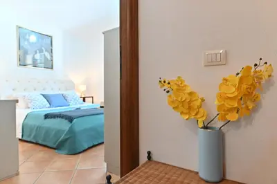 Letto o letti in una camera di IzzHome Gallery