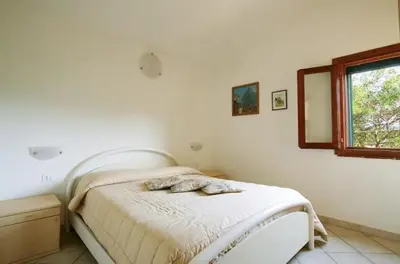 Letto o letti in una camera di Villa Margherita