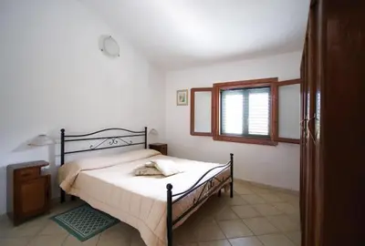 Letto o letti in una camera di Villa Margherita