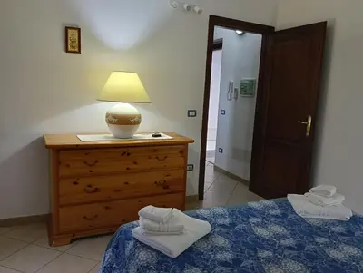 Letto o letti in una camera di L'orchidea