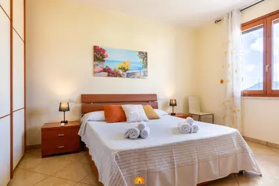 Letto o letti in una camera di Pascoli Apartment - Pula