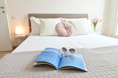 Letto o letti in una camera di IzzHome Oasis