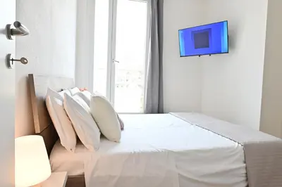 Letto o letti in una camera di IzzHome Oasis
