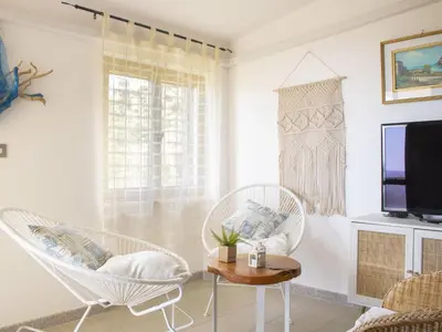 TV o dispositivi per l'intrattenimento presso Apartment Vista Mare In Sardegna by Interhome