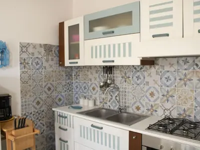 Cucina o angolo cottura di Apartment Vista Mare In Sardegna by Interhome