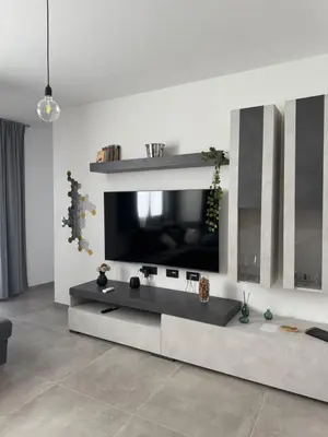 TV o dispositivi per l'intrattenimento presso Domus Aura Apartments