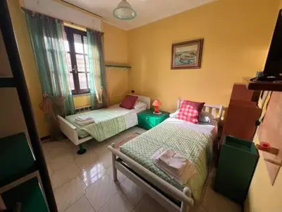 Letto o letti in una camera di Case vacanze Efisio e Vilma