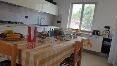 Cucina o angolo cottura di B&B Blueberry via Capri Porto Frailis