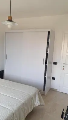 Letto o letti in una camera di B&B Blueberry via Capri Porto Frailis