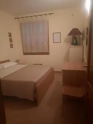 Letto o letti in una camera di casaMauro