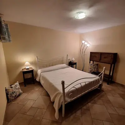 Letto o letti in una camera di Villa Gaia Villasimius