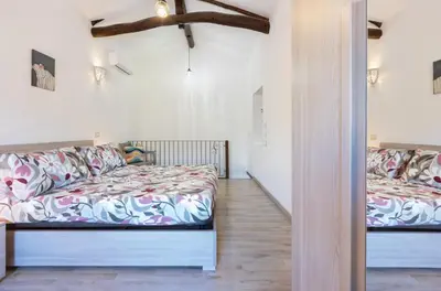 Letto o letti in una camera di GuestHost - My Little Pink House