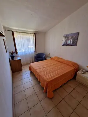 Letto o letti in una camera di La casa di Andrea