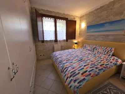 Letto o letti in una camera di Sea House Deluxe - Residenza del Sole