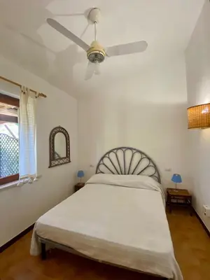 Letto o letti in una camera di Casa Lucia